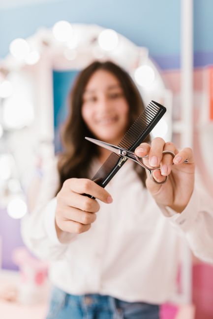scissors,comb,hair-styling,portrait,blurred-background